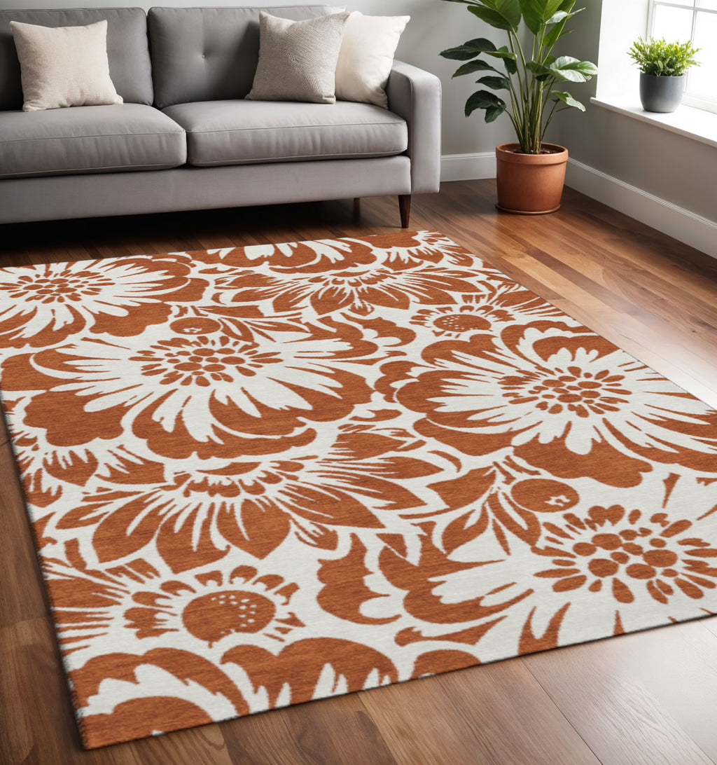 5' X 8' Rust And Ivory Floral Washable Area Rug With UV Protection