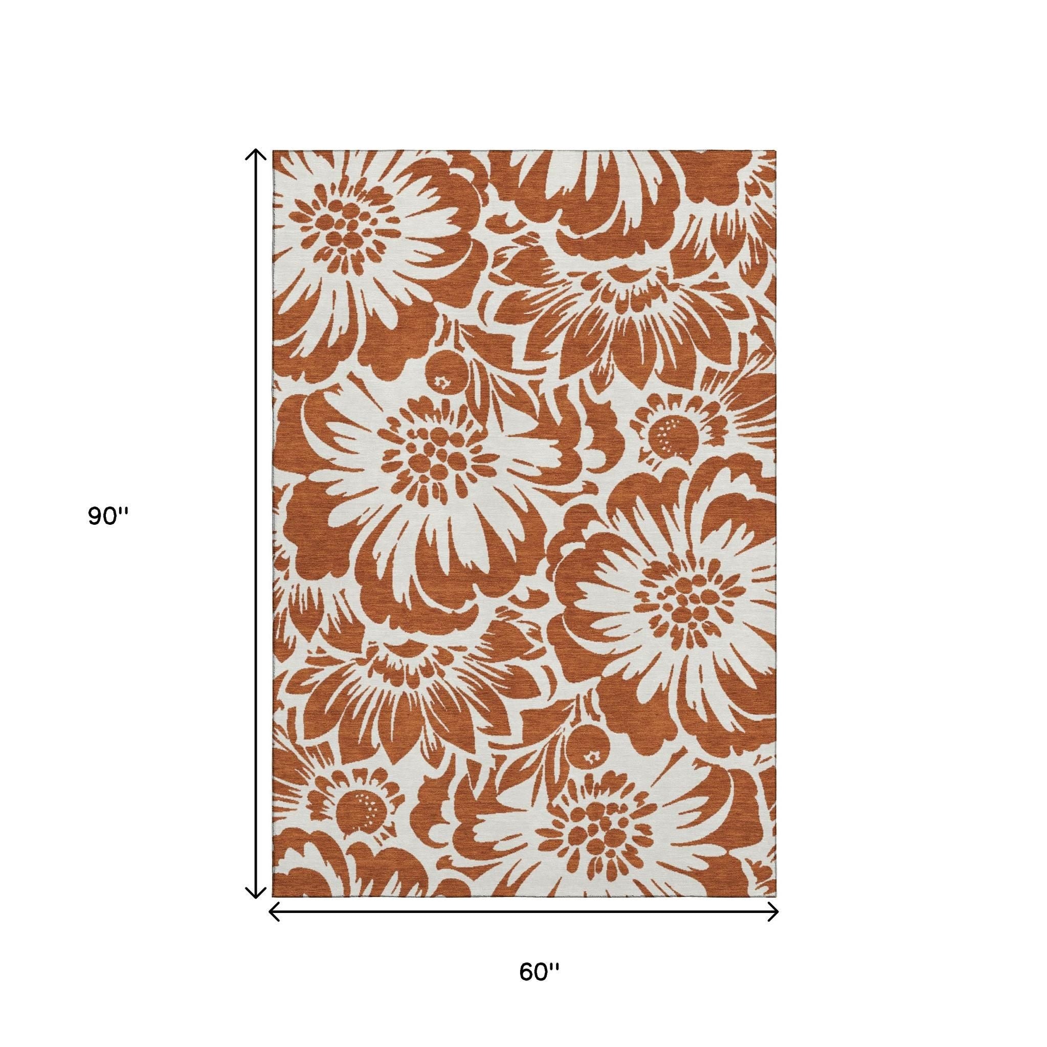 5' X 8' Rust And Ivory Floral Washable Area Rug With UV Protection